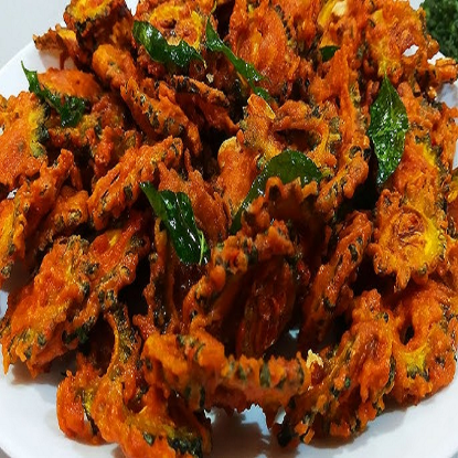 కాకరకాయ పకోడి 100 గ్రా యొక్క చిత్రం