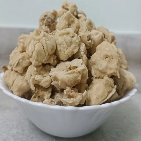 చేతితో తయారు చేసిన సాంప్రదాయ  గుమ్మడి వడియాలు – క్రిస్పీ & టేస్టీ హోమ్‌మేడ్ డిలైట్స్ (200gm) కోసం అసలైన ఎండబెట్టిన గుమ్మడికాయ వడలు యొక్క చిత్రం