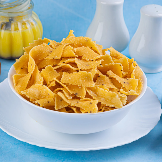 సాంప్రదాయ క్రిస్పీ ఎల్లో రిబ్బన్ స్నాక్స్ - శనగపిండి & సుగంధ ద్రవ్యాలతో తయారు చేసిన అసలైన దక్షిణ భారత రిబ్బన్ మురుక్కు (200 గ్రాములు) యొక్క చిత్రం