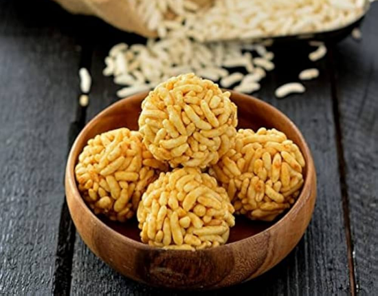 సాంప్రదాయ ముర్మురా ఉండ (పొంగిన బియ్యం – బెల్లం ఉండలు) – ఆరోగ్యకరమైన కరకరలాడే భారతీయ స్వీట్ స్నాక్, అసలైన ఇంటి రుచితో (150 గ్రాములు) యొక్క చిత్రం