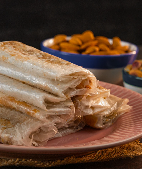 పూతరేకులు – 5ముక్కలు | సంప్రదాయ హోమ్‌మేడ్ సన్నగా మెలికలైన స్వీట్ రోల్స్ | బెల్లం, డ్రై ఫ్రూట్స్ & బియ్యం పేపర్‌తో తయారు చేసిన అసలైన దక్షిణ భారతీయ మిఠాయి యొక్క చిత్రం