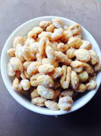 సాంప్రదాయ షుగర్ గవ్వలు – తీయదనంతో నిండిన బంగారు రంగు క్రిస్పీ గవ్వలు (200గ్రా) యొక్క చిత్రం