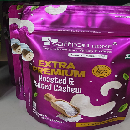 కుంకుమపువ్వు అదనపు ప్రీమియం కాల్చిన & సాల్టెడ్ జీడిపప్పు 200gms యొక్క చిత్రం